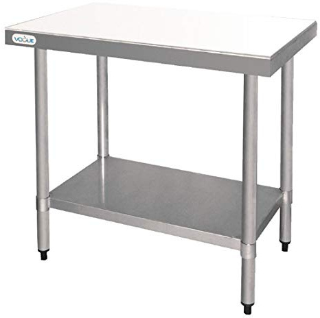 Vogue Cutting Board Table St/St - 900x600x900mm 35 1/2x23 1/2x35 1/2 | Provides a stable, high-capacity food preparation surface for busy commercial kitchens and catering setups.