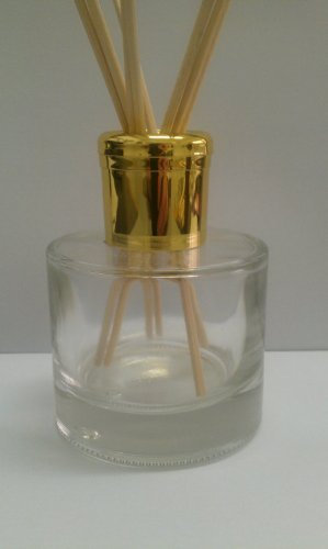 Reed Diffuser Air Freshener Empty Round Glass Diffuser Bottle with Shiny Gold Cap and Travel Plug. Use diffuser bottle to make your own designer room fragrances.