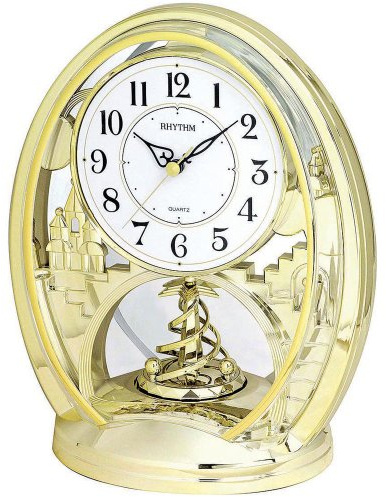 Rhythm Cont Mantel Clk Oval Gilt/Arabic Dial/Rotating Pend
