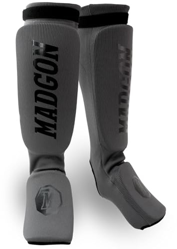MADGON Schienbeinschoner mit perfektem Sitz und idealer Polsterung! Schienbein-Schutz mit geringer Schweißentwicklung. Beinschützer aus Stoff für Kampfsport, MMA, Kickboxen - 1 Paar inkl. Beutel!