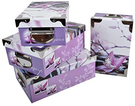 2J Orchidea e ciottolo Set di 4 scatole di cartone con coperchio stampato Orchidea e ciottolo con angoli e maniglie in metallo. Dimensioni: 23x15x9,25x16.5x10,27x18x10.5,29x20x11cm