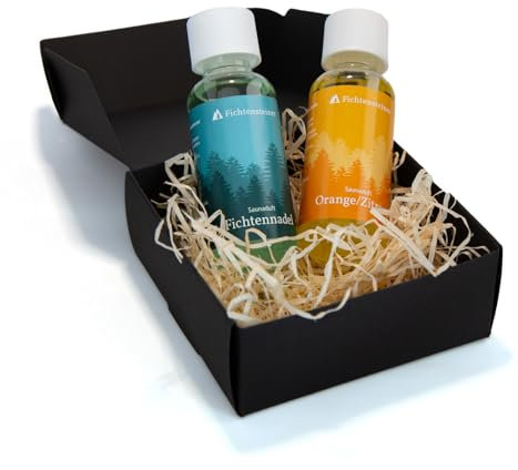 Fichtensteiner Saunaaufguss Geschenkset Fichtennadel, Orange/Zitrone - 2x 100ml Sauna Aufgussmittel in edler mattschwarzer Geschenkbox - Sauna Aufguss für bis zu 100 Aufgüsse - Wohltuender Saunaduft
