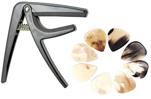 Capotasto con 8 plettri per ukulele a 4 corde