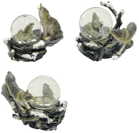 Wolf auf schneebedecktem Felsen und Welpen in Einer Schneekugel (C)