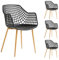 IDIMEX Juego de 4 sillas Lucia para comedor o cocina de diseño retro con reposabrazos, carcasa de plástico negro y 4 patas de metal decoración roble Sonoma