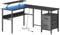 VASAGLE L-förmiger Schreibtisch mit Steckdosen, Eckschreibtisch, Computertisch, Monitorständer, Gaming-Tisch, LED-Beleuchtung, USB-Anschlüsse, 150 x 120 x 76 cm, ebenholzschwarz LWD095B01