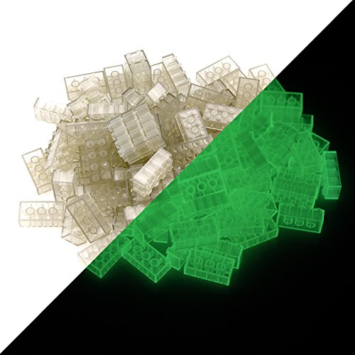 LUMENTICS 100 Klemmbausteine 2x4 Transparent - Im Dunkeln leuchtende Spielsteine. Kompatibel, passgenau und geprüft. Leuchten bis zu Einer Stunde nach Aufladen. Von 3 bis 99 Jahren.