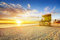adrium Poster-Bild 70 x 50 cm: Miami South Beach Sonnenaufgang mit Rettungsschwimmerturm und Küste mit bunten Wolken und blauem Himmel.(30178265)