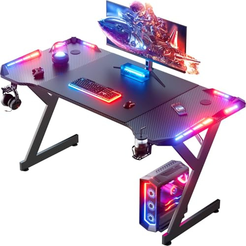 DLONGONE 140 x 60cm Gaming Desk with LED Lights, Sturdy Gaming Table, Computer PC Desk for Home Office, Gamer Table with Headphone Hook and Cup Holder, Black