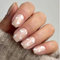 24 Piece Set of Short, Square False Nails with White Heart Prints - Easy to Apply Stick-On and Removable Glue-On Options for Women and Girls' Nail Art