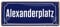 Alexanderplatz - Retro Deko Blechschild - Metallschild Geschenk Geburtstag Alexander - Dekoration Schild Berlin Alexanderplatz - Straßenschild Form - Hauptstadt Souvenir Mitbringsel - 28x12cm