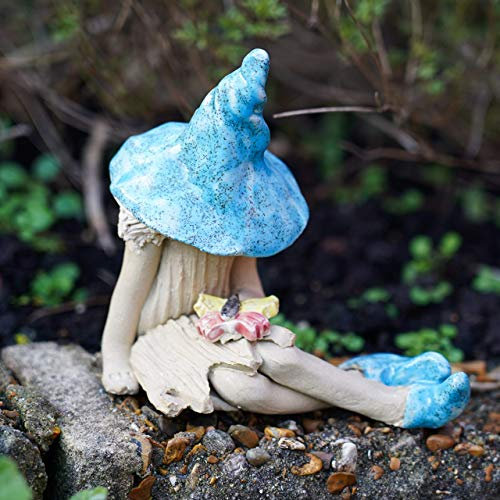 Shy fairy figurine, pixie plant pot ornament, hand made fairy garden pottery fairy, holding a butterfly, light blue.