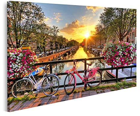 Bild auf Leinwand Schöner Sonnenaufgang Über Amsterdam In Den Niederlanden Mit Blumen Und Fahrräder Auf Der Brücke Im Frühjahr Wandbild Poster Kunstdruck Bilder