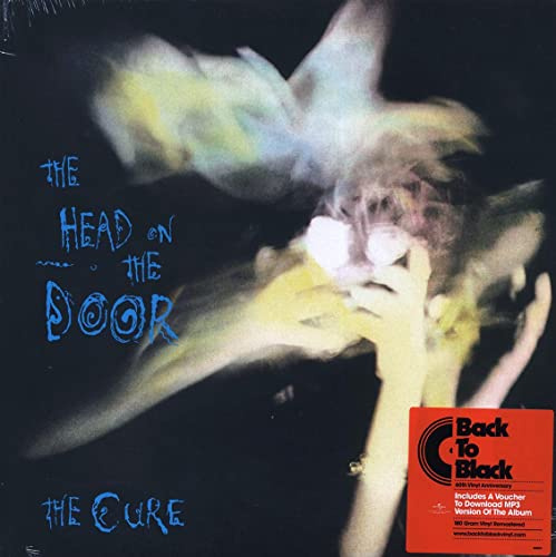 CURE-THE HEAD ON THE DOOR