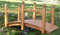 Beauty.Scouts Zierbrücke Petunia Kiefernholz massiv honigbraun 128x62,5x69cm Brücke Teichbrücke Gartendeko Deko Gartendekoration Holzsteg Teichübergang