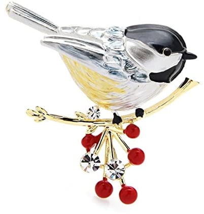 Brosche aus Stahl mit Vogel auf Zweig., Edelstahl