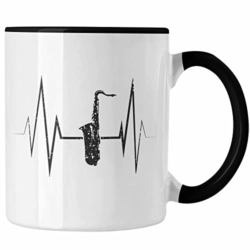 Trendation - Saxophon Tasse Geschenk Herzschlag Saxophonist Kaffeebecher Geschenkidee Lustig (Schwarz)