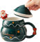 Generisch Tazza natalizia, tazza da tè in ceramica, 500 ml, con coperchio a forma di cappellino di Natale e cucchiaio di Babbo Natale, tazza di succo con per caffè caldo, tè