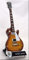 MICK JONES Miniatur-Gitarre Rolling Stones mit Plektrum