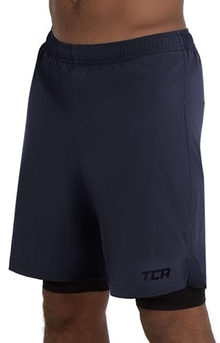 TCA Ultra Sporthose Herren kurz 2 in 1 mit Tasche - Kurze Sport Shorts Trainingshose mit Taschen - Laufhose mit Kompressions Innenhose und Reißverschluss Handytasche - Dunkelblau/Schwarz, L
