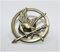 Broche retro de bronce con diseño de Juegos del Hambre en 2 estaciones