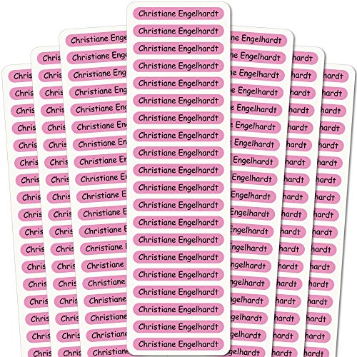 INDIGOS UG Namensaufkleber Kinder - 51x7 mm - 140 Stück Sticker für Kinder, Schule und Kindergarten - Stifte, Federmappe, Lineale - rosa Hintergrund - individueller Aufdruck