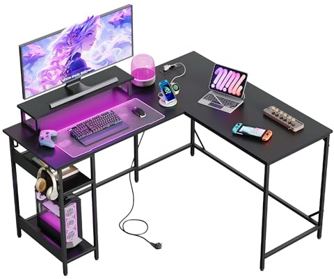 DEVAISE Eckschreibtisch L Form 140 x 120 cm mit Steckdose und USB, Computertisch mit Ablageflächen für Homeoffice, Gaming & Schlafzimmer, Schwarz