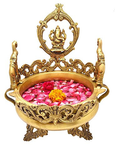 Urli with decorative design and Lord Ganesh