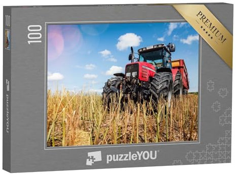 puzzleYOU: Puzzle 100 Teile „Prächtige Ansicht eines Traktors mit Anhänger in einem abgeernteten Rapsfeld“ – aus der Puzzle-Kollektion Traktoren