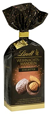 Lindt Schokolade Weihnachts-Mandeln Edelbitter , 100 g ,Geröstete Mandeln in dunkler Cococrème und Edelbitter Schokolade mit einem Hauch von Zimt und Koriander , Schokoladengeschenk