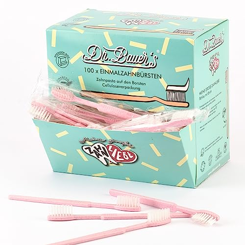 Dr. Bauer's Einmalzahnbürsten mit Zahnpasta - 100er Pack - Nachhaltige Einwegzahnbürste Ideal für Reisen, Zahnärzte, Hotels - umweltfreundlich mit Strohanteil in praktischer Spenderbox (rot)