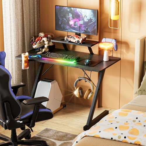 Gaming Tisch mit Monitorständer, Z-förmiger Schreibtisch Schwarz, Stabiler Computertisch Kohlefaserbeschichtung, Gamer PC Tisch mit Getränkehalter Gamepad-Ständer Kopfhörerhaken 100x54.5x75 cm