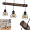 HOFSTEIN Pendelleuchte Cool Spring, längliche Vintage Hängelampe aus Metall, Höhe 152,5 cm, 3-flammig, 3 x E27, Retro Hängeleuchte mit Holzbalken,ohne Leuchtmittel
