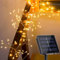 DINOWIN Solar Cluster Lichterkette Außen 29.5Ft 300 LED Wetterfest 8 Modi Silber Draht Lichterkette Outdoor für Balkon Garten Terrasse Party Hochzeit Deko (Warmweiß)