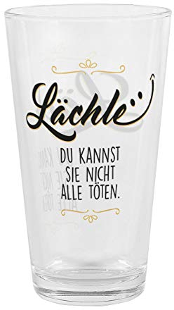 Herz & Heim® Trinkglas mit Spruch - Lächle, Du kannst sie nicht alle töten. - Geschenk Kollegen