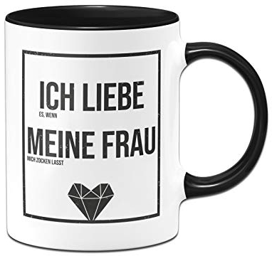 Tassenbrennerei Gaming Tasse mit Spruch Ich liebe es wenn meine Frau mich zocken lässt - Kaffeetasse lustig - Geschenk für Gamer - Spülmaschinenfest (Schwarz)