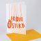 10 schöne Karten für Ostern: Frohe Ostern (Handlettering: Ulrike Jensen), Klappkarten mit gelborangenem Umschlag