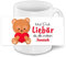 Tasse mit Namen Janosch und schönem Motiv - Bär mit Herz - zum Valentinstag für Verliebte