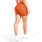 SMILODOX Sport Shorts Damen Amaze Pro, Seamless Blickdichte Radlerhose, Unsichtbarer Scrunch-Effekt, V-Shape High Waist Kurze Sporthose Biker Shorts Yoga Fitness Gym, Größe:L, Color:Orange