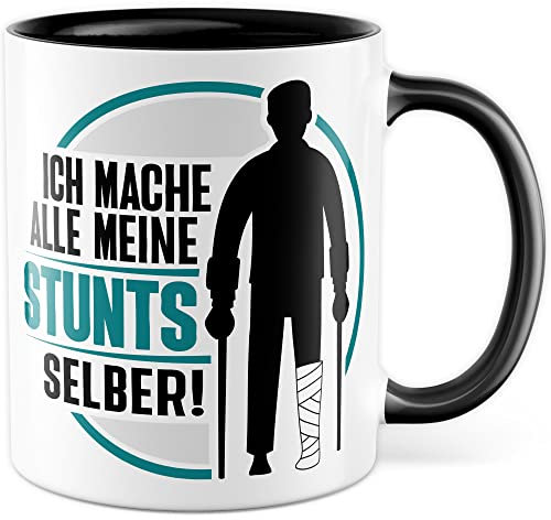 Lustige Tasse Stuntman Kaffeetasse mit Witz Kaffee-Becher mit lustigem Motiv Ich mach alle meine Stunts selber Geschenk Bruch Krankenhaus Gute Besserung Geschenkidee Humor (Schwarz)