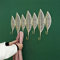 Kaibrite Gold Hakenleiste aus Metall mit 7 Hooks Wandgarderobe Metall Wandgarderobenhaken Golden Blätter Kleiderhaken Mehrzweck 65 * 42 * 6cm
