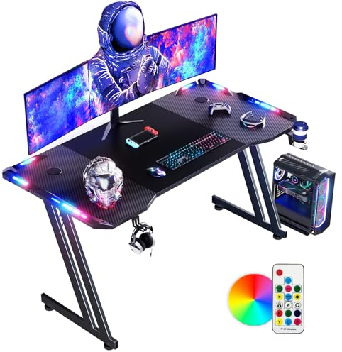 DLONGONE 140 x 60cm RGB Gaming Desk, Gaming Table for Laptop, Home Office Desk with Carbon Fiber Coated, Gaming PC Desk with Headphone Hook and Cup Holder, Easy to Assemble, Black