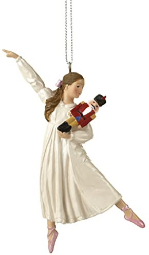 Clara Holding a Nutcracker Christmas Ornament