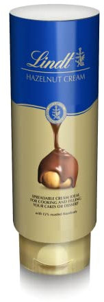 Lindt Crema de cacao y avellanas, chocolate fluido, ideal repostería, postres, coberturas, fondues, rellenos, toppings y untar, sin gluten, sin aceite de palma, bote bocabajo antigoteo 650g