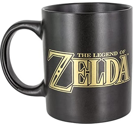 Paladone Taza Escudo Hyrule Zelda - Taza Negra y Dorada Oficial, Regalo para Gamers y Fans de Link