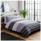 Sleepdown Set copripiumino reversibile, motivo a righe testurizzate, facile da pulire, morbido e comodo, con federa, colore: nero e grigio, per letto singolo (135 x 220 cm)
