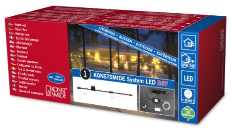 Konstsmide LED System Anschlusskabel für 1040 Dioden / 100 Meter, inkl. Feinsicherung t1.25 A (2 x Ersatzsicherung), 24V Außentrafo. 60 VA (IP44), schwarz/transparentes Kabel - 4600-003