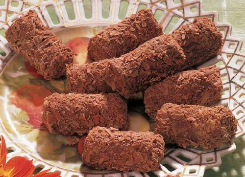Schilfer Trüffel 400g (1 Packung) zergehen auf der Zunge. Unter der „Rauen Schale“ aus zarten Vollmilch-Schokoladen-Raspeln verbirgt sich ein weicher Kern. €32,38/kg