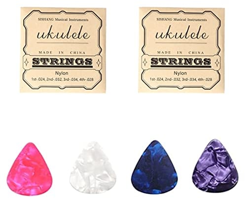6 piezas Incluye 2 juegos de cuerdas de nailon para ukelele Soprano Barítono Concierto Cuerdas blancas para soprano (21) / Concierto (23) / Tenor (26) y 4 celuloide