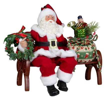 Monopol Christmas Paradise Weihnachtsmann 28cm auf Bank Santa sitzend Dekofigur